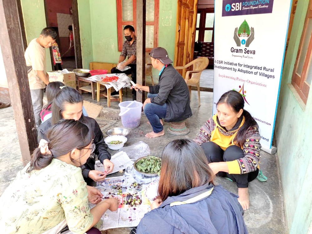 SHGs representatives learn local food processing and preservation technique at a skill development training organised by AIDA under SBI Foundation-Gram Seva Programme.